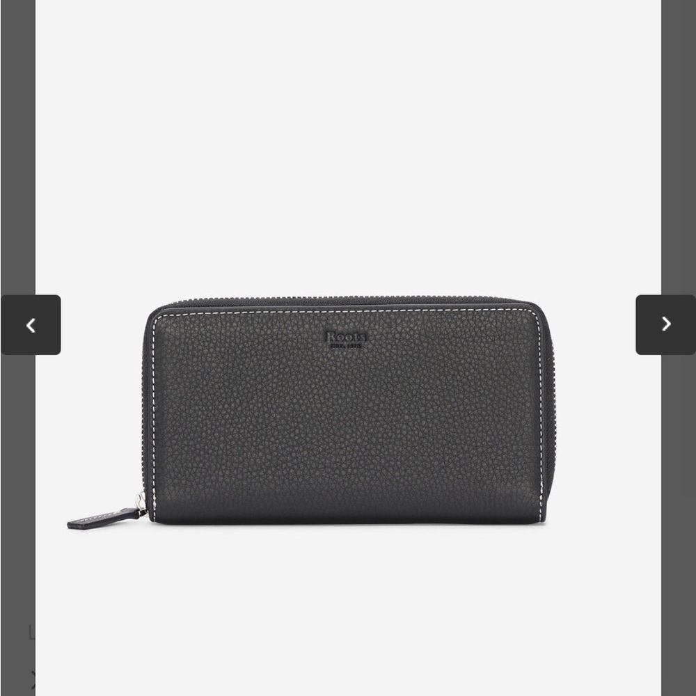 NWOT Roots Premium Leather Wallet
